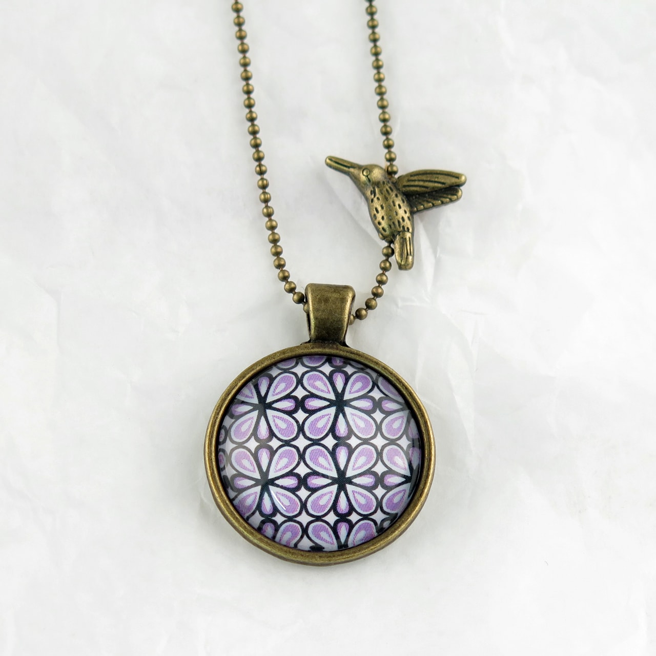 Medaillon-Halskette Muster lila/schwarz