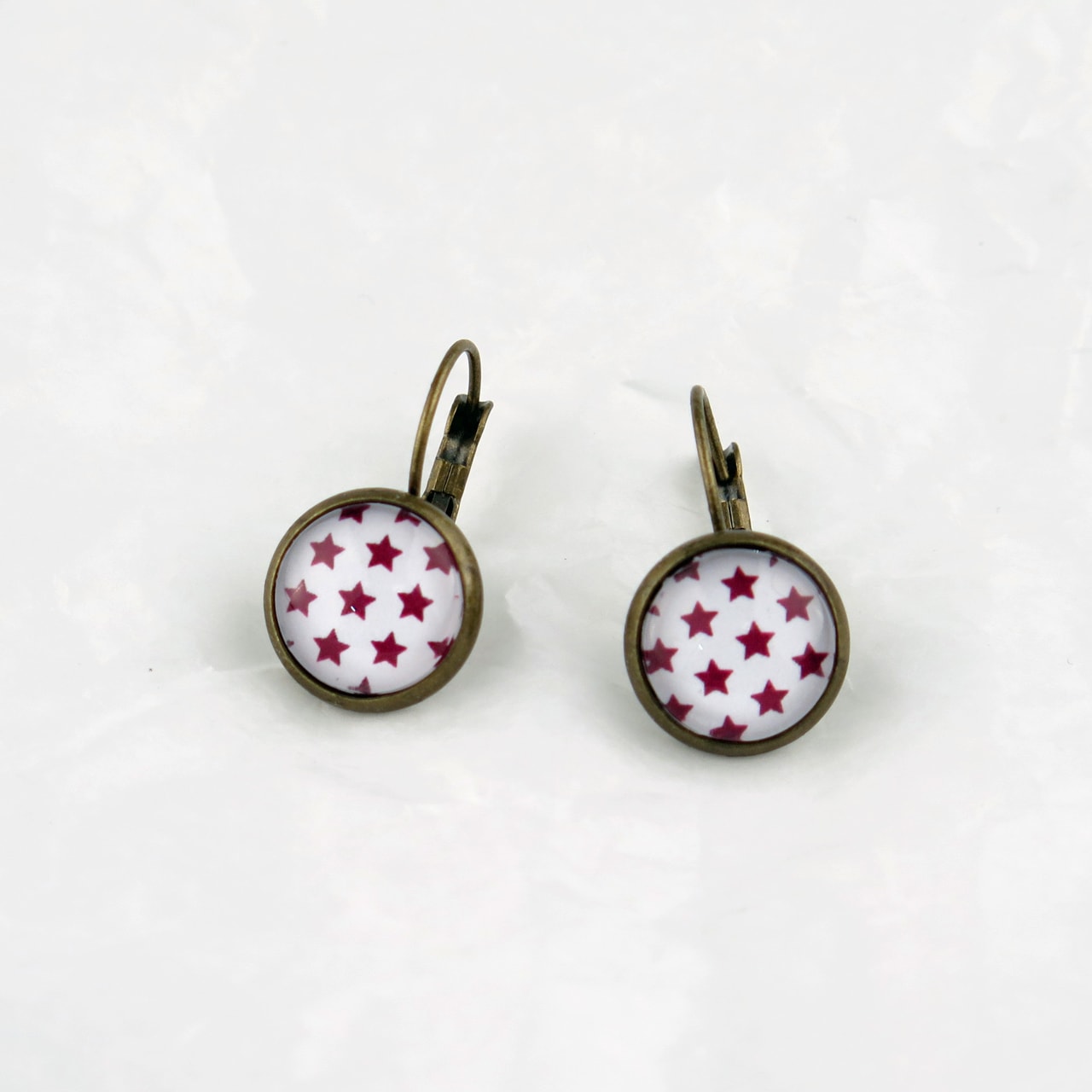 Ohrring weiss/lila Sternchen