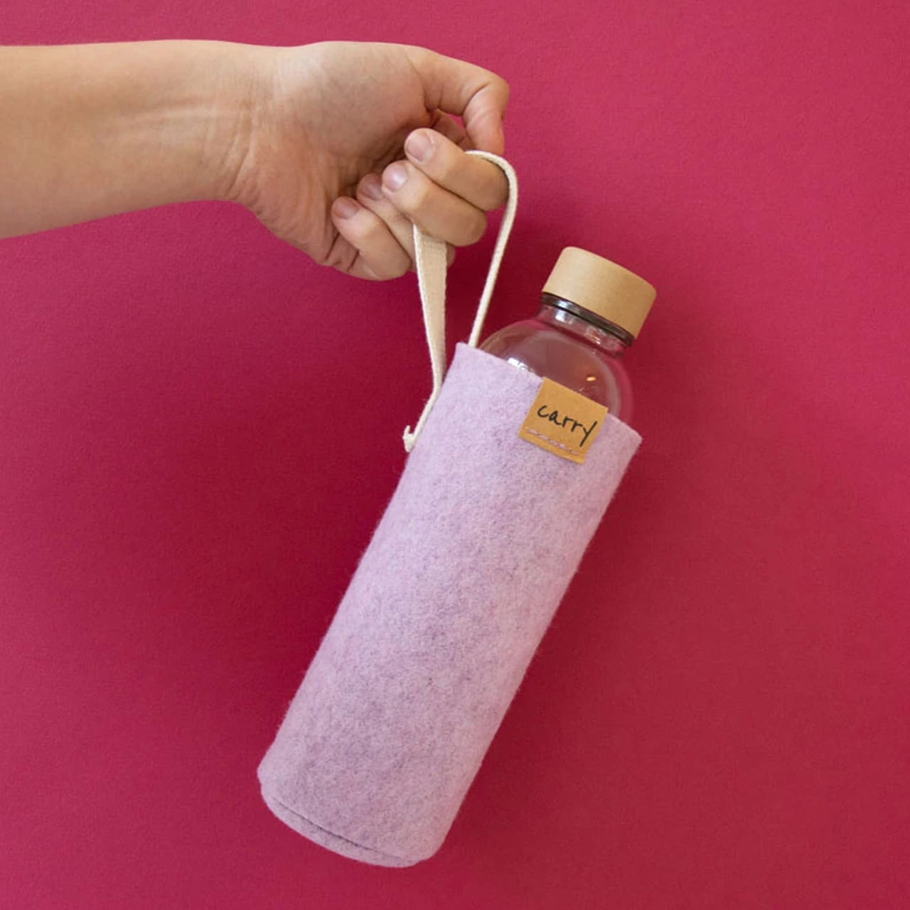 CARRY Schutzhülle magnolia an Hand