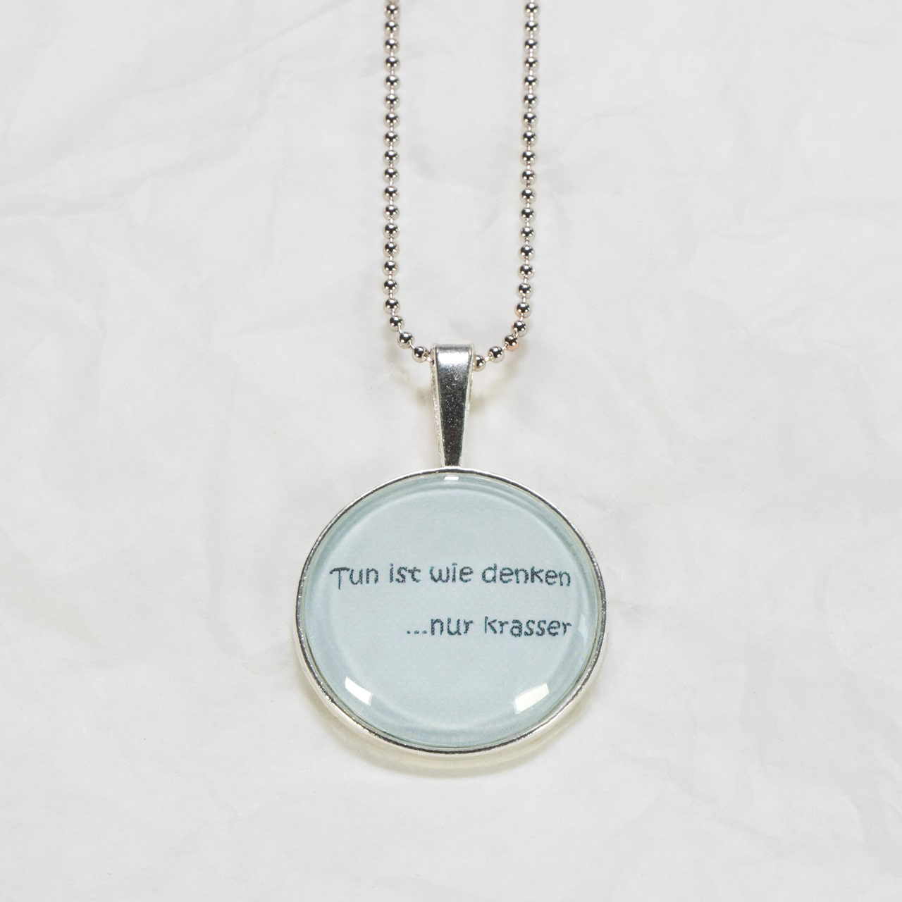 Medaillon-Halskette "Tun ist..."