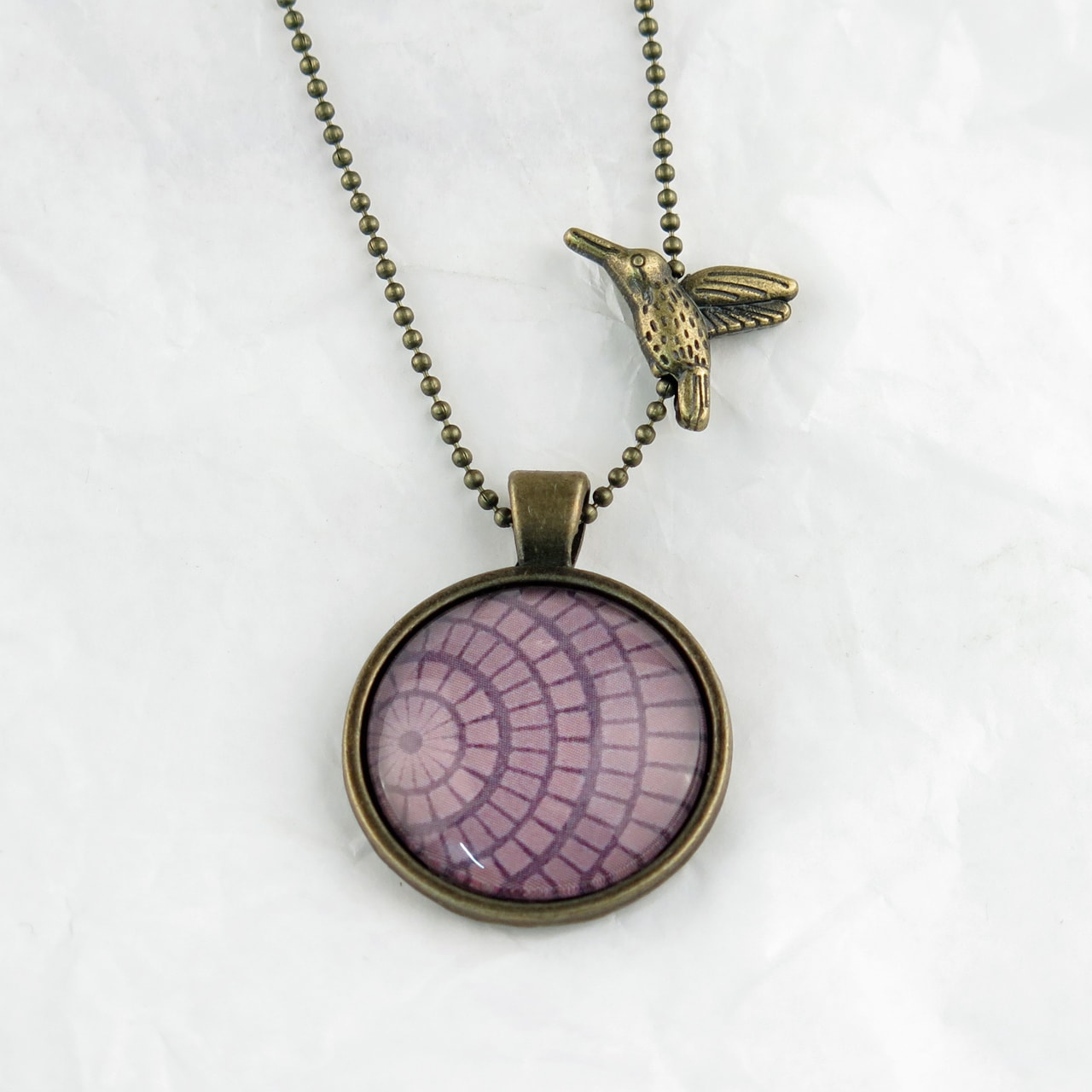 Medaillon-Halskette lila Kreismuster